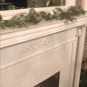 Decorative garland with frosted berries